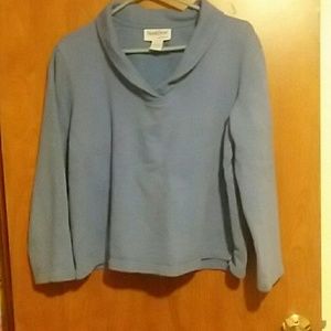 A cowl neck sweatshirt.